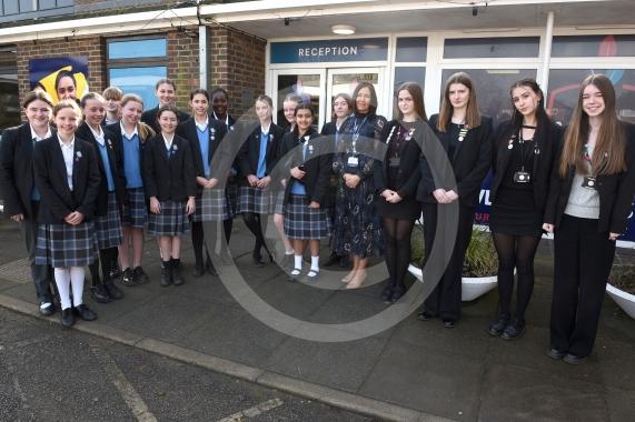 Headteacher Jo Capon and students outside Newlands Girls' School, Maidenhead The school is implementing a ban of smartphones on the school site from September. 