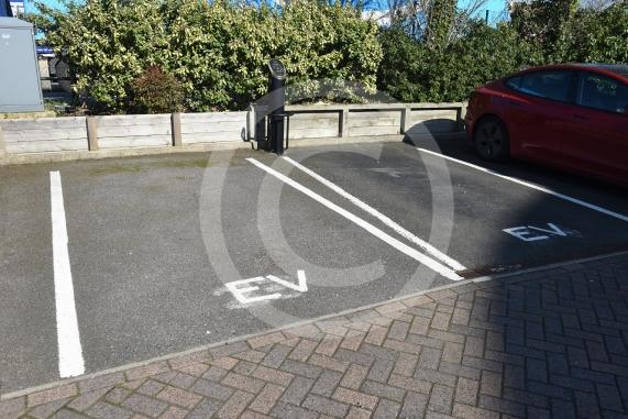 Residents are upset that an electrical vehicle charging system is billing everyone who doesn&rsquo;t own an EV car of money via their service charge for communal electricity useHurricane Court, 79 Heron Dr, Langley, Slough SL3 8FA