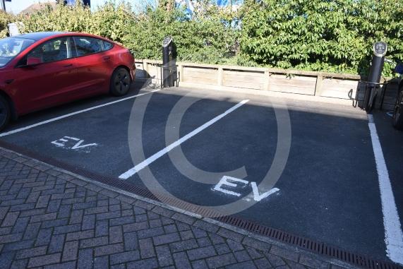 Residents are upset that an electrical vehicle charging system is billing everyone who doesn&rsquo;t own an EV car of money via their service charge for communal electricity useHurricane Court, 79 Heron Dr, Langley, Slough SL3 8FA