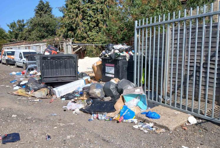 Residents hit out at 'nightmare' pile of rubbish behind Slough flats