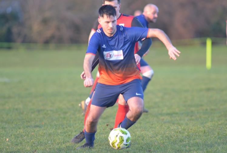 Wigmore brace helps side close gap on league leaders